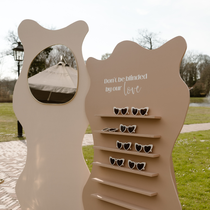 Don't be blinded by our love - sunglass wall